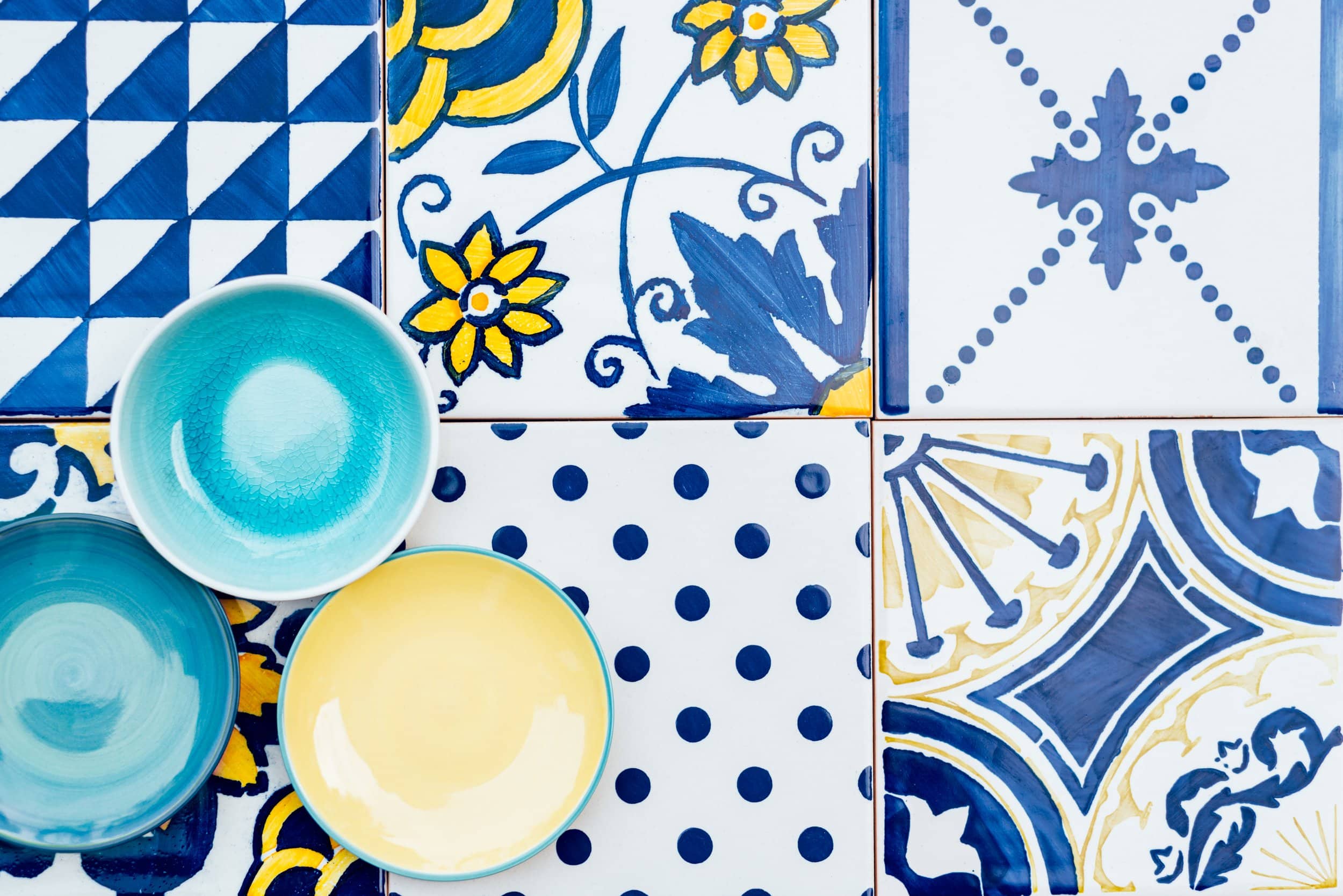 Decorative painted tiles and bowls