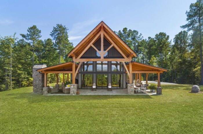 Exterior of a modern wooden house with green trees